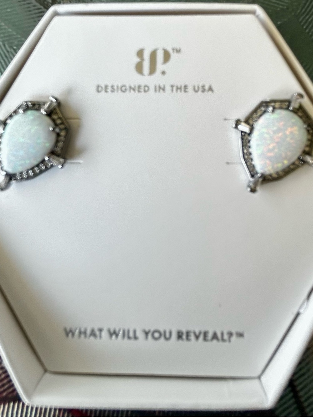 Bomb Party 2025 October earrings. Lab grown milky white opal on hematite plating